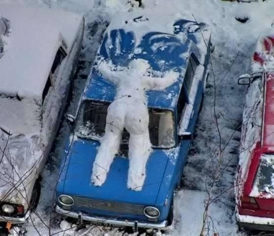 Snowman hit by car